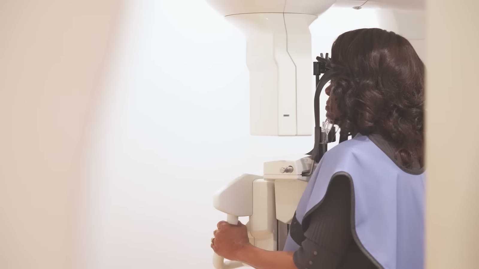 A patient having a 3D scan taken in the imaging room at ANEWU